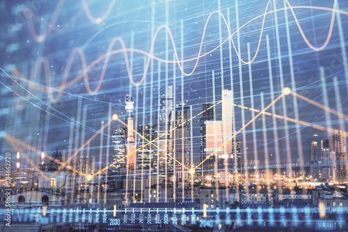 Double exposure of financial chart on Moscow city downtown background. Concept of stock market analysis