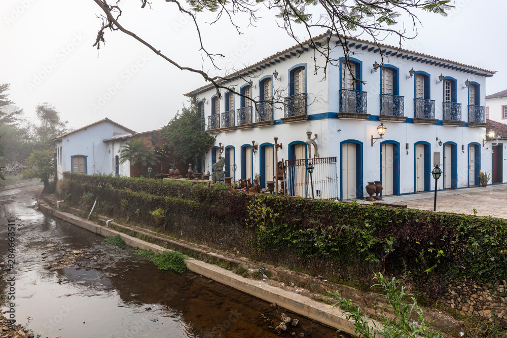 Historic Center with river and fog in the city of Tiradentes Minas Gerais Brazil Historic Center with river and fog in the city of Tiradentes Minas Gerais Brazil