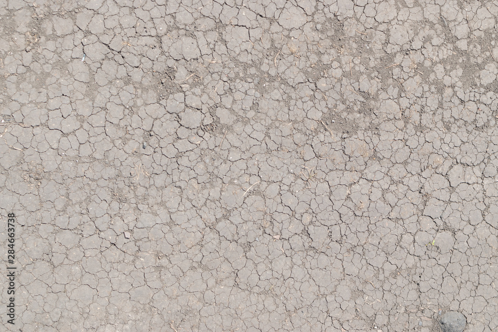 Cracked Dry Earth Top View as Global Warming Concept Cracked Dry Earth Top View as Global Warming Concept