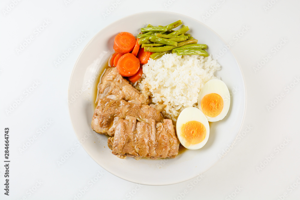 Baked pork ribs with rice, boiled egg and vegetable Baked pork ribs with rice, boiled egg and vegetable