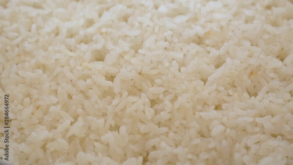 cooked rice close-up cooking. Fresh hot food carbohydrate cooked rice close-up cooking. Fresh hot food carbohydrate