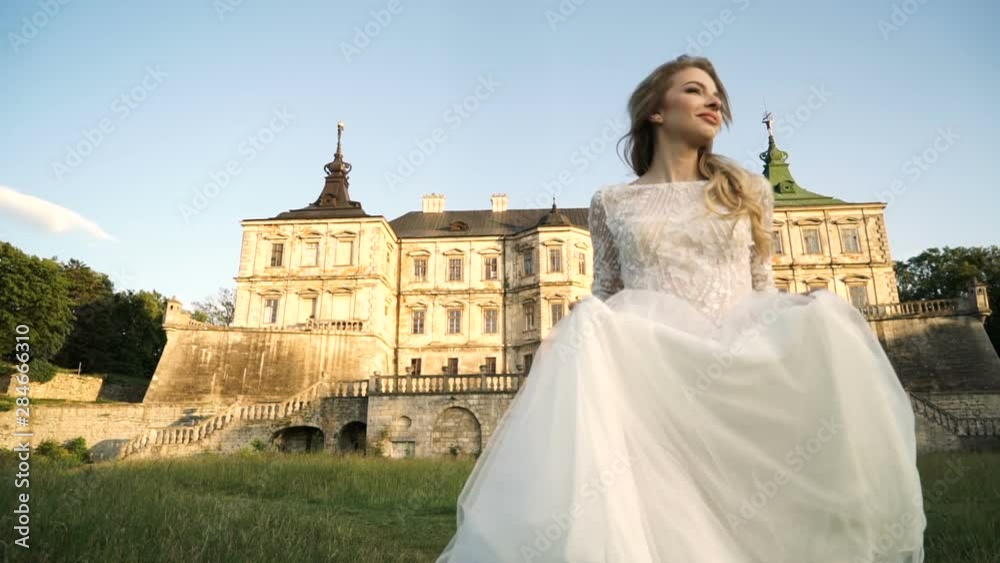 Beautiful bride in wedding dress. Advertising for the salon of wedding dresses Beautiful bride in wedding dress. Advertising for the salon of wedding dresses