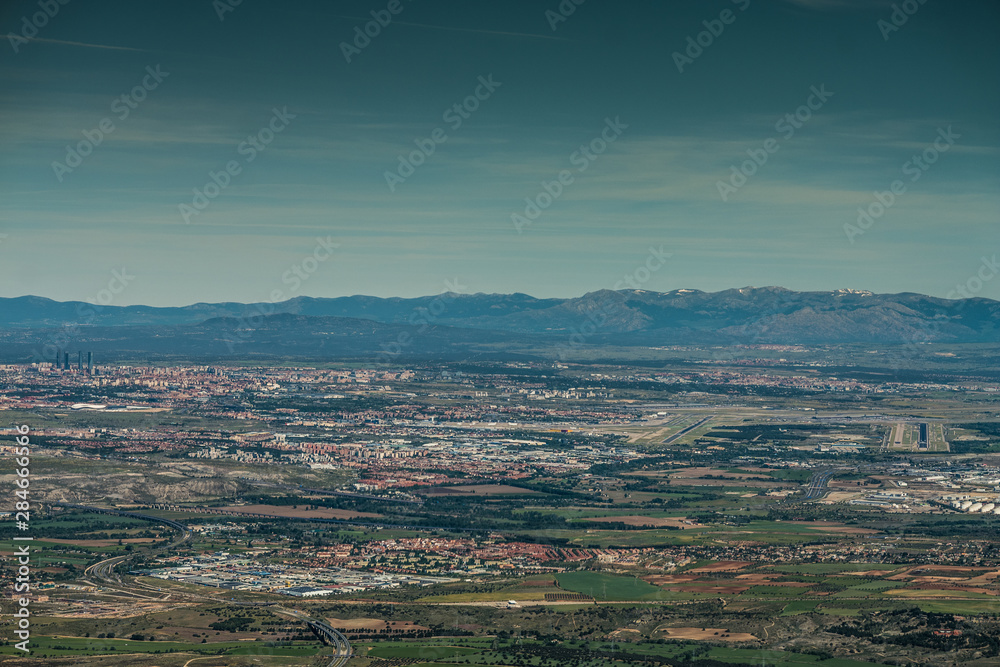 Fototapeta premium Landscape around Madrid Barajas International Airport, Spain, Pilots view during approach into LEMD, MAD - aerial view