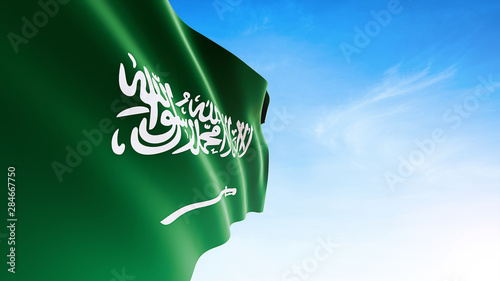 Saudi Arabia flag waving in blue sky, KSA Flag photo