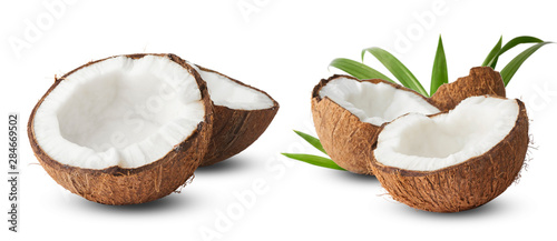 Set with Fresh raw coconut with palm leaves isolated on white background. photo