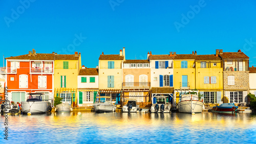 Fototapeta Naklejka Na Ścianę i Meble -  View Of Colorful Houses And Boats In Port Grimaud During Summer Day-Port Grimaud, France