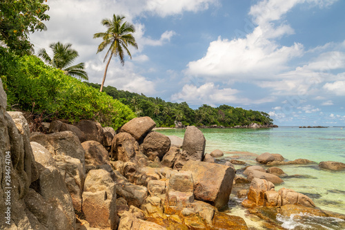 Fototapeta Naklejka Na Ścianę i Meble -  Paradise beach anse royale on Seychelles island Mahé with turguoise water, palms, white sand and granite rocks