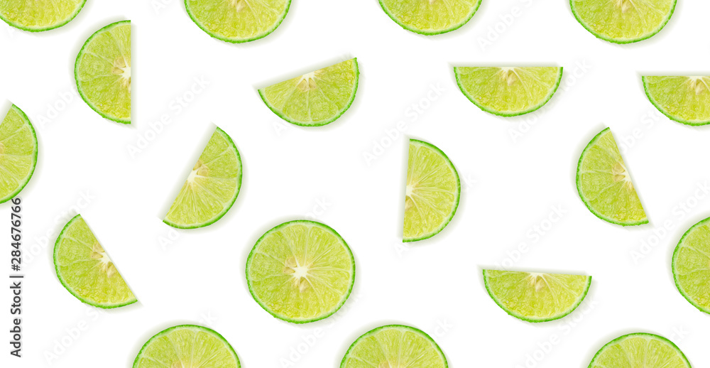 Fruit pattern of lime slices isolated on white background