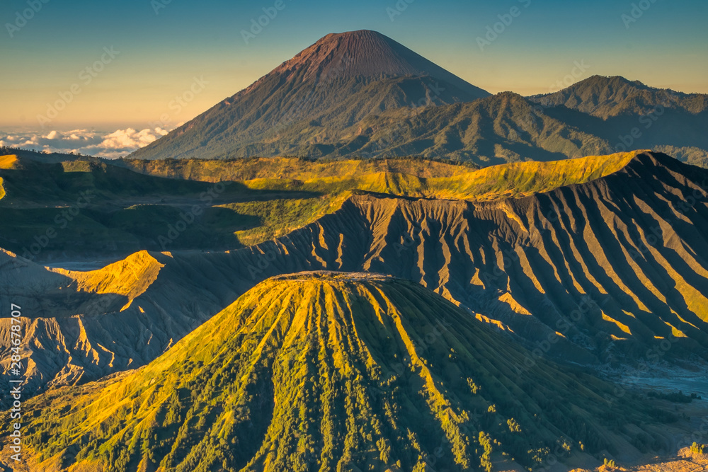 The beautiful sunrise at Mount Bromo volcano, the magnificent view of Mt. Bromo located in Bromo Tengger Semeru National Park, East Java, Indonesia