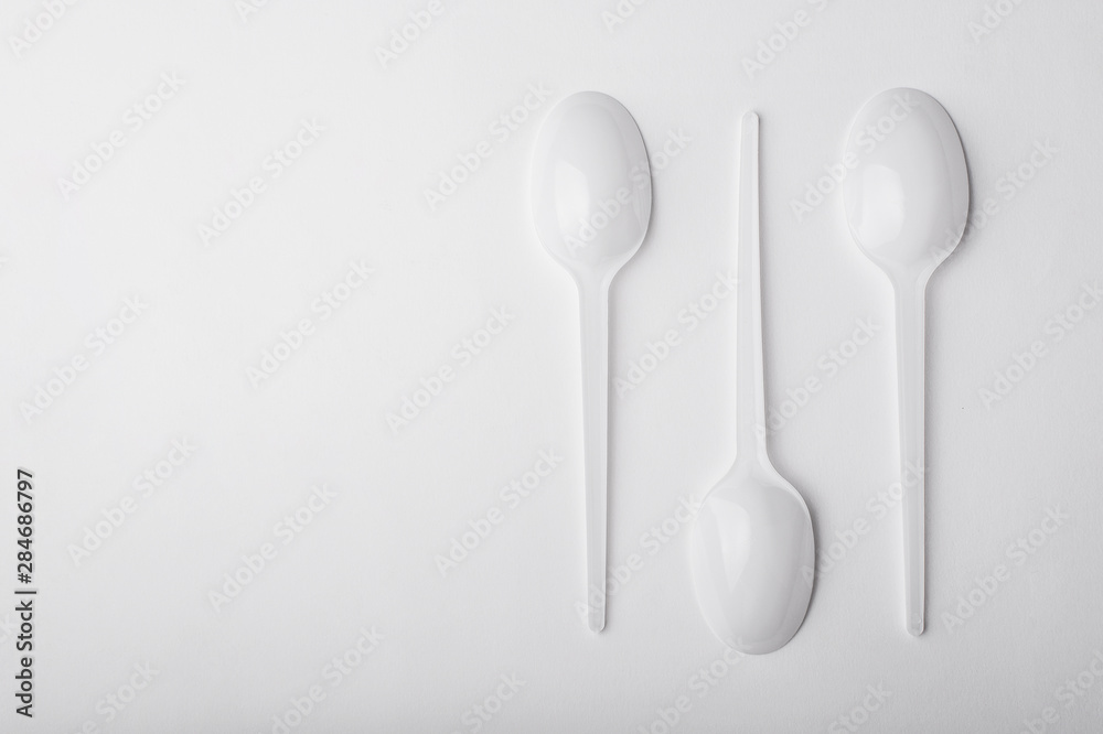 Three plastic spoon on white background. Three plastic spoon on white background.
