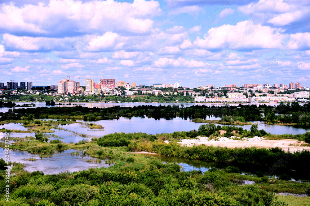 Urban landscape, View of the Angara river, warm lakes near Irkutsk HPP, August 2019, top View.