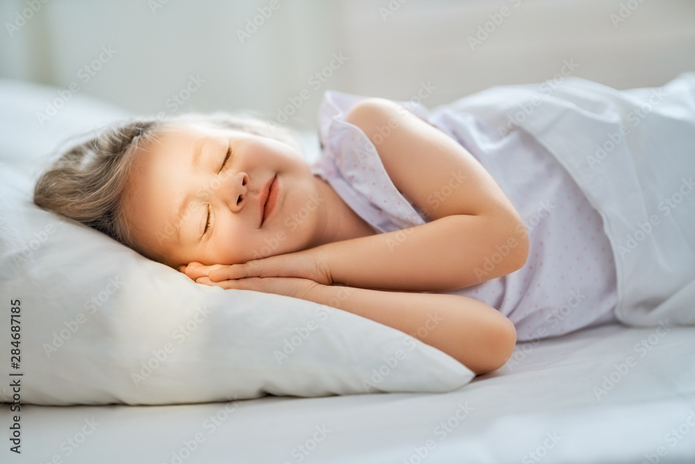 child is sleeping in the bed child is sleeping in the bed