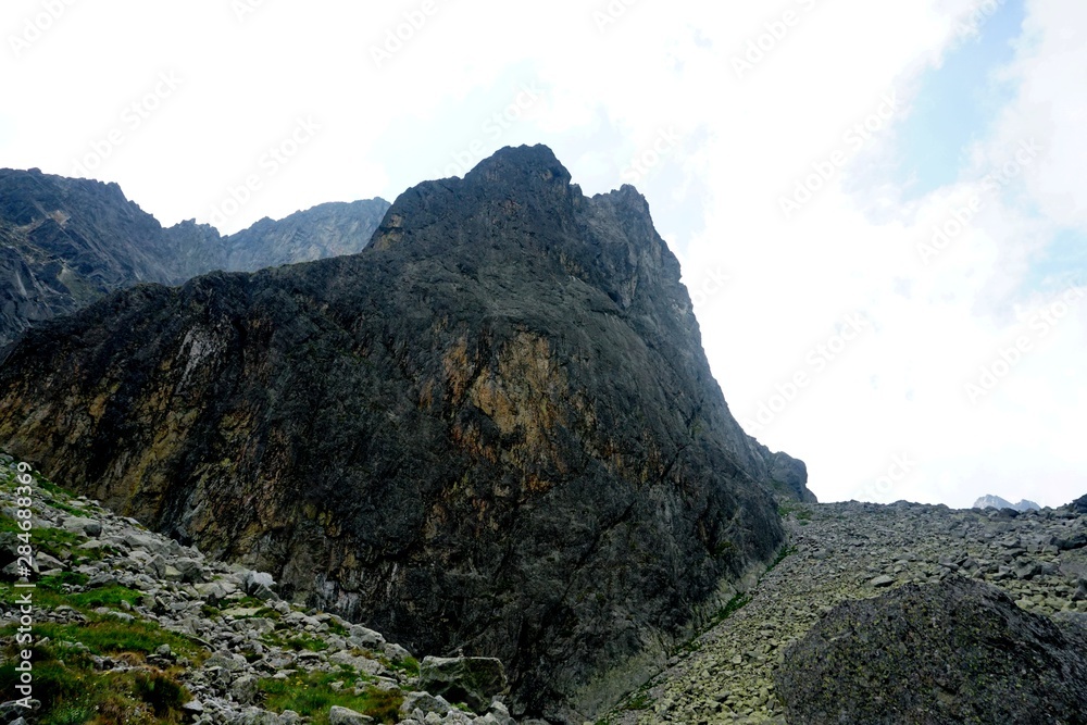 Obraz premium A beautiful landscape with rocky mountain in High Tatry, Slovakia. The High Tatras Mountains in summer