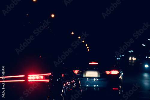Abstract of Blurred image light break cars on the road at night.