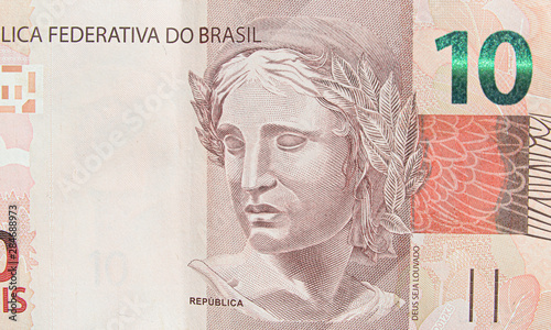 Wallpaper Mural Brazilian ten real banknote. Red note, 10 reais brl. Brazilian money, real note. Macro photo. Torontodigital.ca
