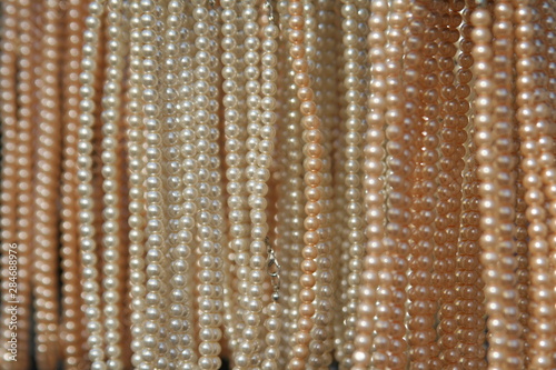 close-up of necklaces with pearls
