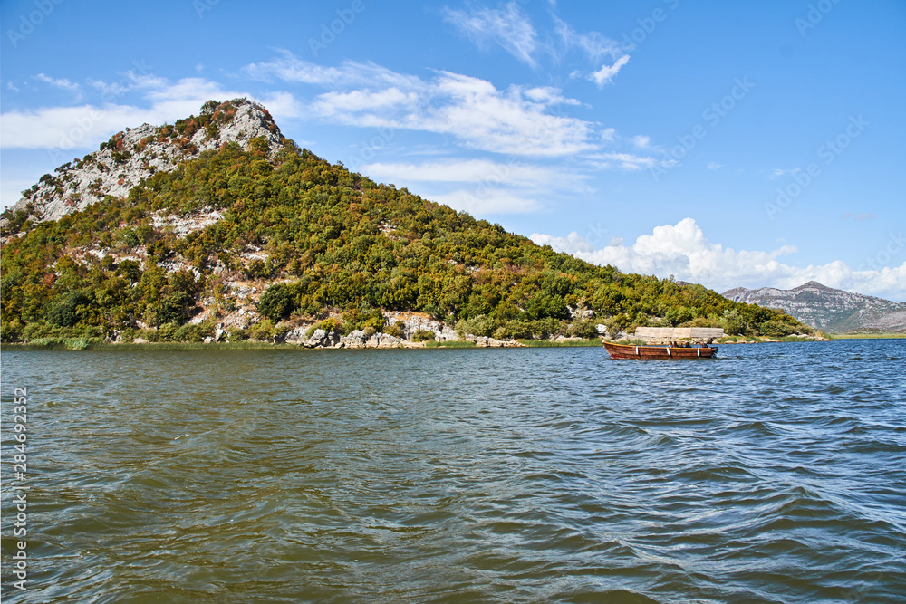 Obraz premium Tourist boat on the Skadar Lake in Montenegro.
