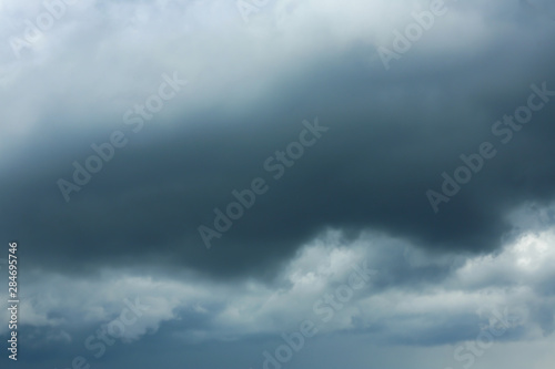 Sky with heavy rainy clouds on grey day © New Africa