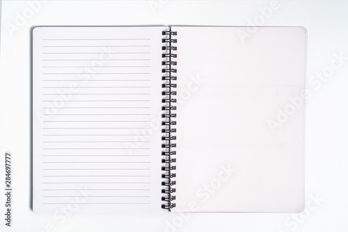 Business concept - Top view collection of spiral kraft notebook front, purple And white open page isolated on background for mockup