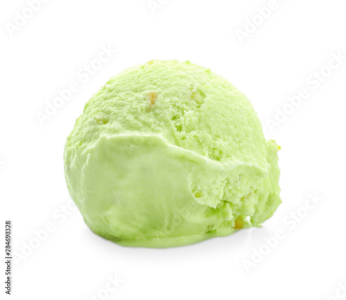 Scoop of delicious pistachio ice cream on white background