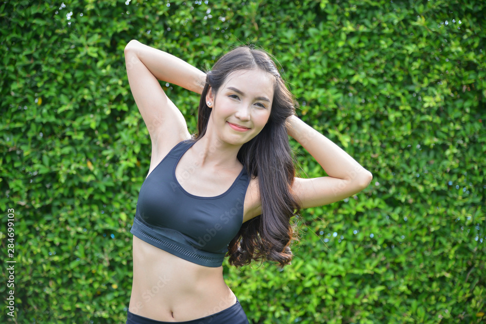 young woman doing yoga exercises in the park young woman doing yoga exercises in the park