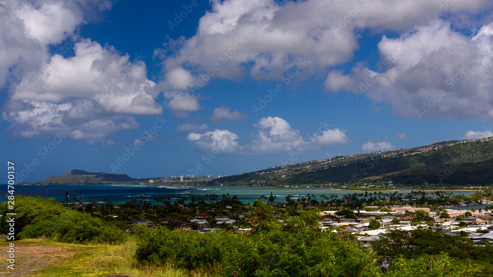 View towards Honolulu's Diamond Head, across the south east shore and houses along the shore