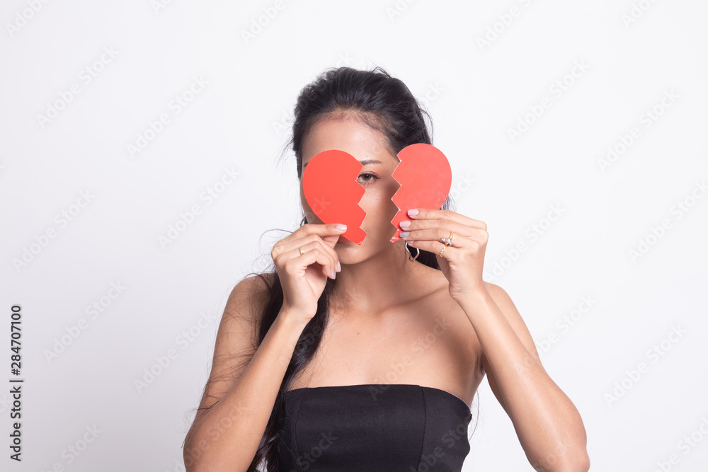 Beautiful young Asian woman with broken heart. Beautiful young Asian woman with broken heart.