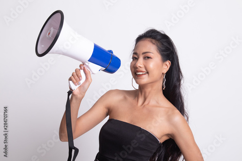 Beautiful young Asian woman announce with megaphone.