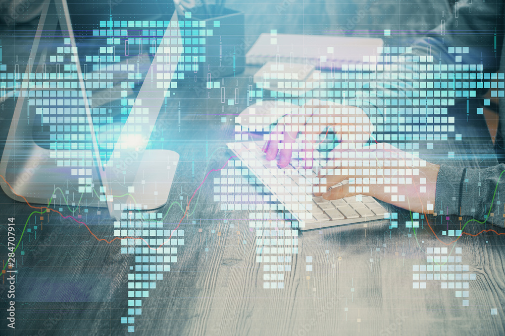 Multi exposure of businessman working on laptop on background. International business hologram in front. Concept of success. Multi exposure of businessman working on laptop on background. International business hologram in front. Concept of success.