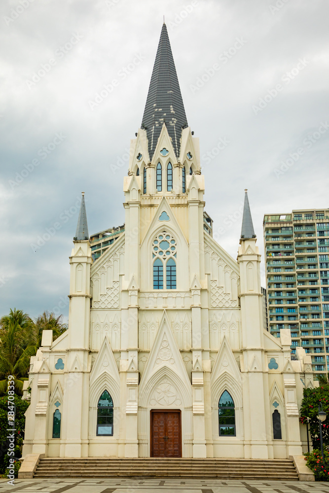 White building of a catholic church in europian quarter in Sanya, Hainan, China