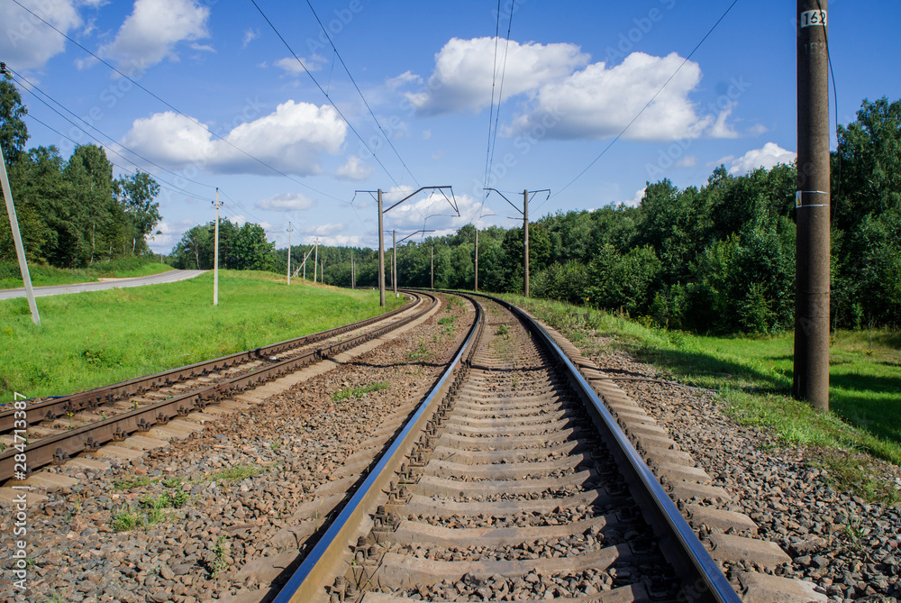 Railways. Rails against the backdrop of a summer landscape.