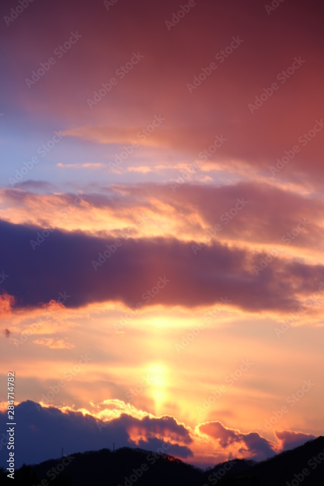 Fototapeta premium 夕焼け 太陽柱