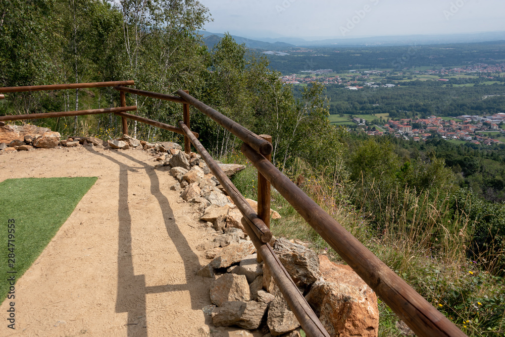 mountain path with stones and trees