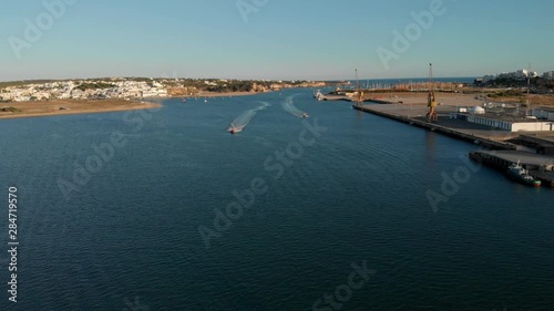 Wallpaper Mural Aerial of fast approaching motor boats on Arade River in Algarve, Portugal Torontodigital.ca