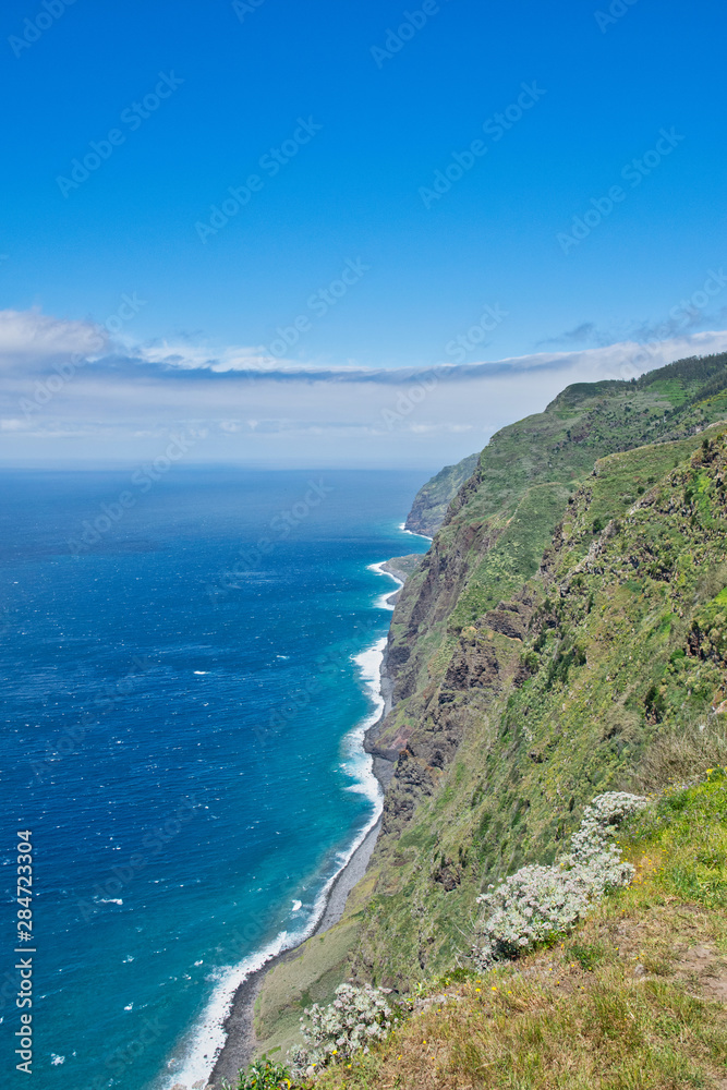 Ponta do Pargo Ilha da Madeira. Lighthouse Ponta do Pargo - Madeira Portugal. The most western point of the island Madeira. View from Lighthouse Ponta do Pargo - travel background. Spring summer Ponta do Pargo Ilha da Madeira. Lighthouse Ponta do Pargo - Madeira Portugal. The most western point of the island Madeira. View from Lighthouse Ponta do Pargo - travel background. Spring summer