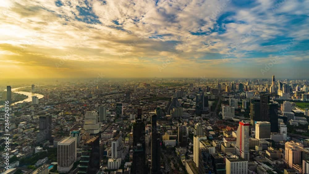time lapse of Bangkok city with sunlight in evening, Thailand