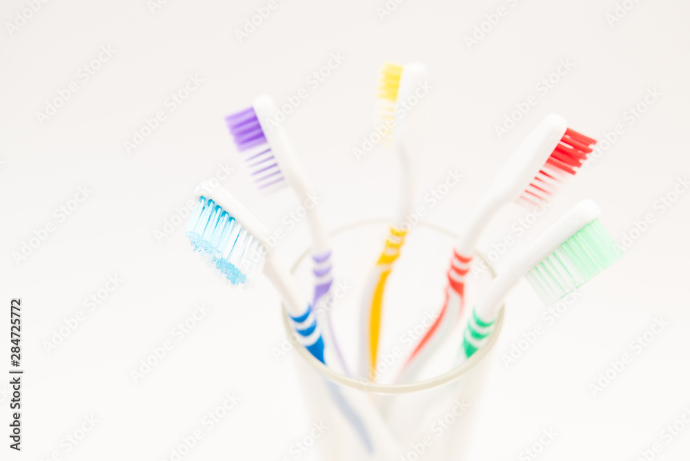set of plastic toothbrushes on white background set of plastic toothbrushes on white background