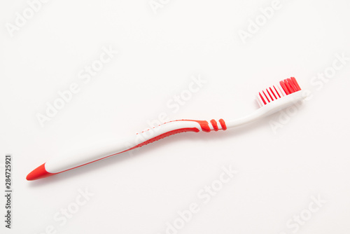 plastic toothbrush on white background