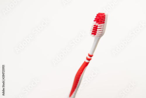 plastic toothbrush on white background