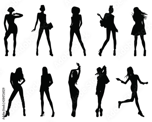 Set of silhouette of fashion girls on a white background