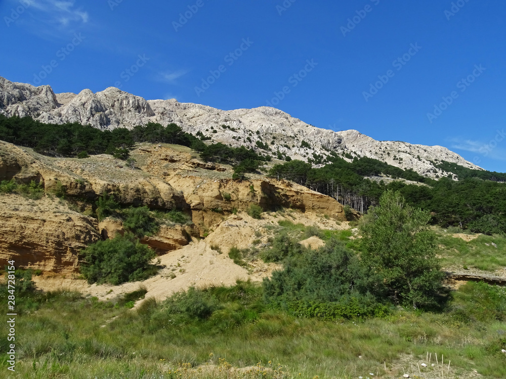 Zarok, details of specific sandy area of Baska, island Krk, Croatia, Europe