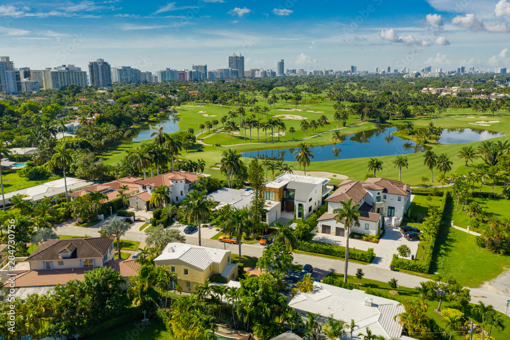 Luxury Miami Beach mansions on golf course landscape