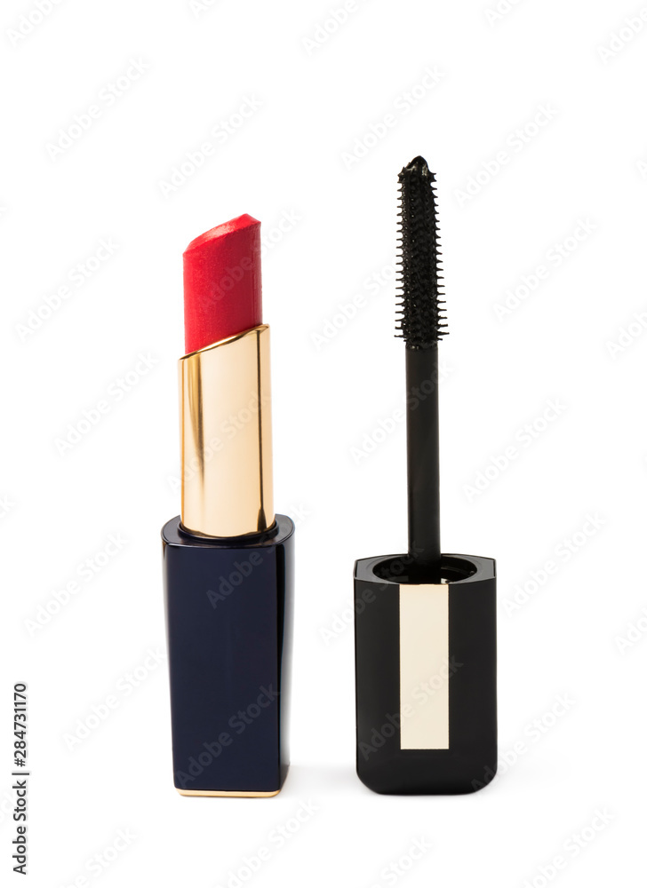 Obraz premium red lipstick and mascara close-up on a white background