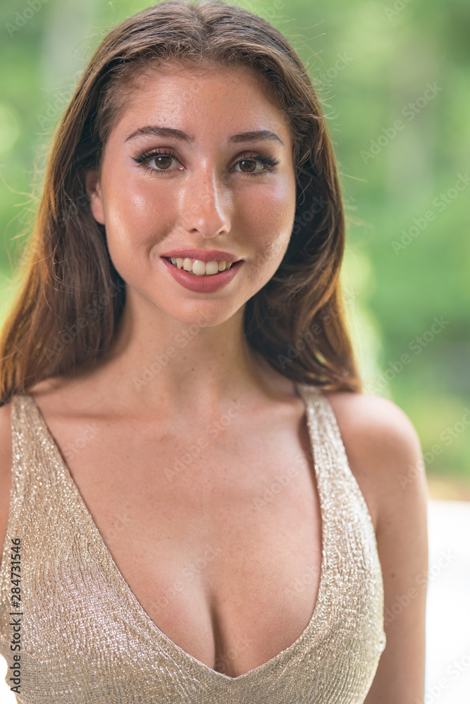 Happy young woman smliing at camera Happy young woman smliing at camera