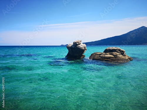 Fototapeta Naklejka Na Ścianę i Meble -  Exotic beach with green, emerald water color