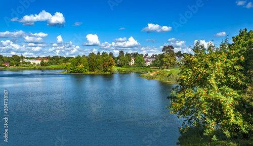 Beautiful summer landscape with a cliff by the lake