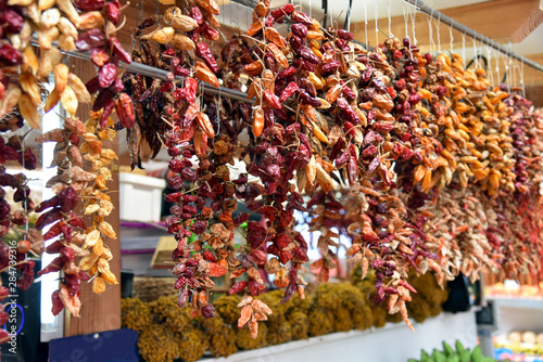 Dried small red peppers on the farmers market in Funchal, Madeira Island.  