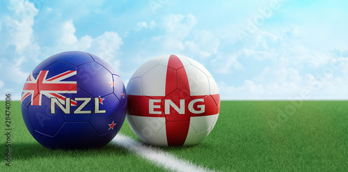 England vs. New Zealand Soccer Match - Soccer balls in England and New Zealand national colors on a soccer field. Copy space on the right side - 3D Rendering 