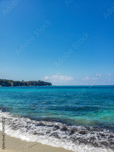 Summer, beach and a turquoise sea.