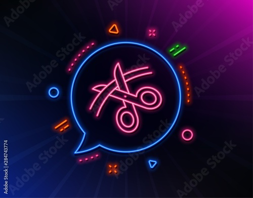 Scissors line icon. Neon laser lights. Cutting ribbon sign. Tailor utensil symbol. Glow laser speech bubble. Neon lights chat bubble. Banner badge with scissors icon. Vector
